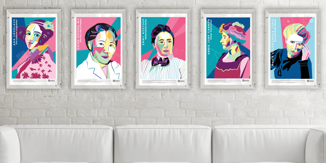 A living room setting, with five framed posters on the wall. The posters dipict various women in STEM.
